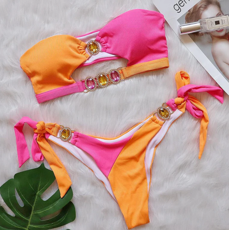 Close-up of the Italia Couture 'Mae' Strapless Bikini, showcasing intricate bejewelled details and bold colours.