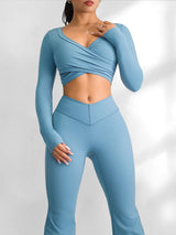 Woman wearing a blue athletic outfit on a white background