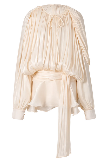 Beige apricot Ruffled dress with long sleeves and a draped design on a white background