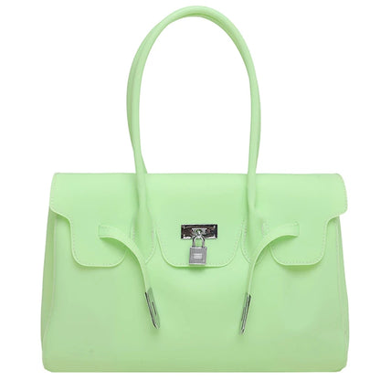 Light green Jelly Firkin Bag with a silver lock on a white background