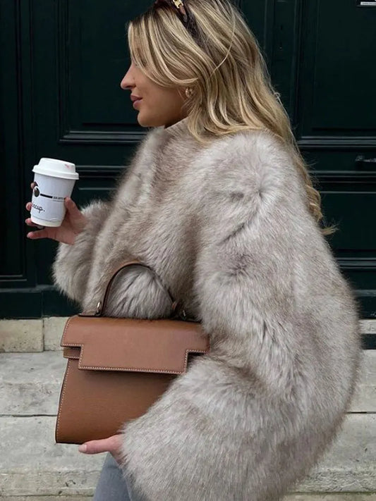 Woman modelling the Italia Couture Luxury Thick Fluffy Faux Fur Coat 
